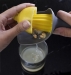 Presse agrume 'sans pépin 'noir/jaune avec filtre à pépin intégré