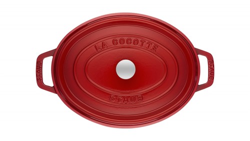 Cocotte en fonte Staub ovale cerise 31 cm avec couvercle à bouton laiton