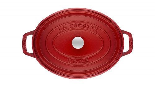 Cocotte en fonte Staub ovale rouge cerise 23 cm avec couvercle à bouton laiton