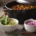 Cocotte en fonte ovale noire 41 cm avec couvercle à bouton laiton