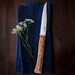 Coffret de 4 couteaux de table lame lisse Facettes manche en bois d'Olivier