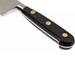 Couteau de cuisine du chef Forgé Pro 25 cm manche noir rivets laiton