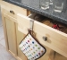 Crochet pour tiroir ou porte