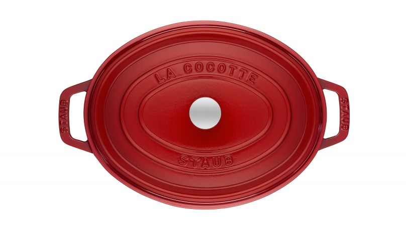Cocotte en fonte Staub ovale cerise 31 cm avec couvercle à bouton laiton -  1004238 - STAUB